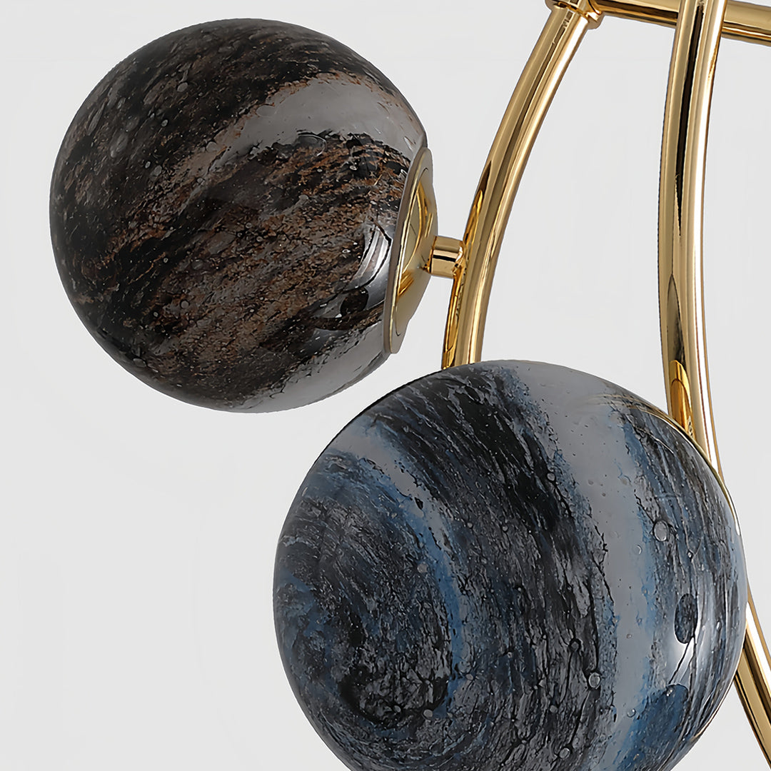 Gold semi flush ceiling light with dark glass spheres creating sophisticated contrast in modern fixture