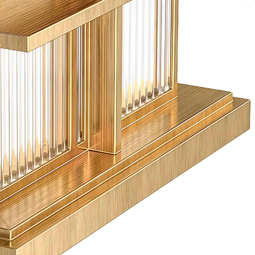 Modern square porch pillar lights shown in gold finish with clear vertical glass panels.