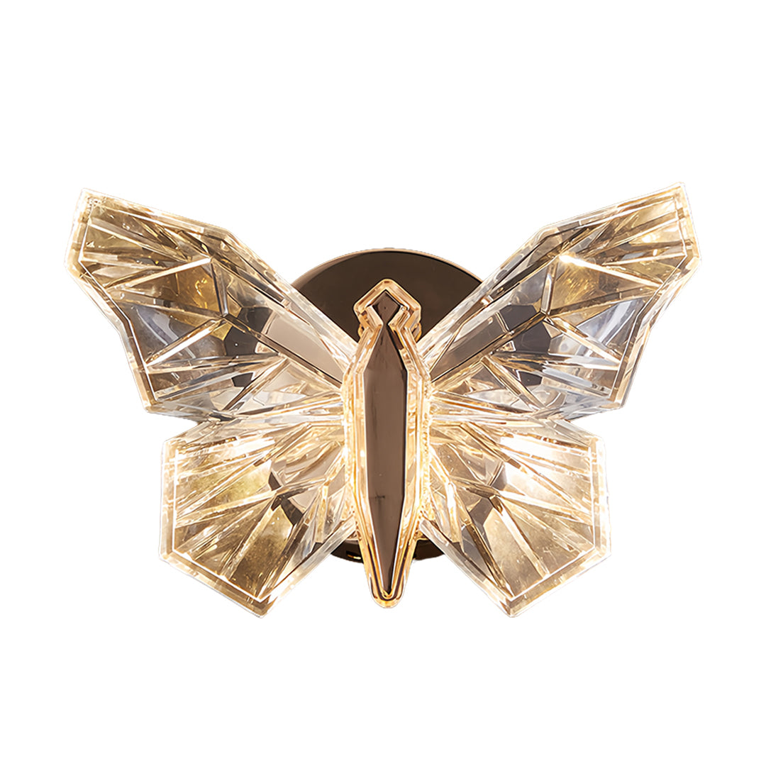 Decorative butterfly wall light featuring warm golden translucent wings with intricate vein patterns
