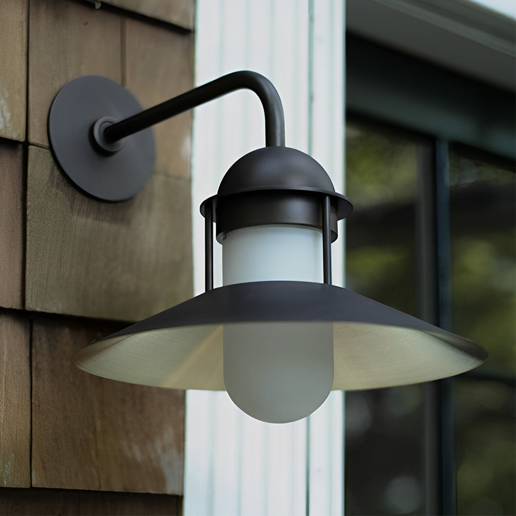 Gooseneck wall light fixtures with a detailed view of their adjustable arm and glass shade.