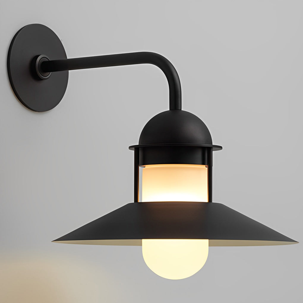 Gooseneck wall light fixtures with a black finish, mounted on a white wall.