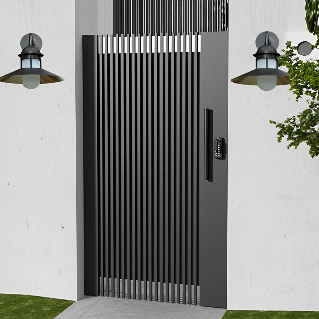 Gooseneck wall light fixtures mounted beside a wooden door, enhancing the entrance.