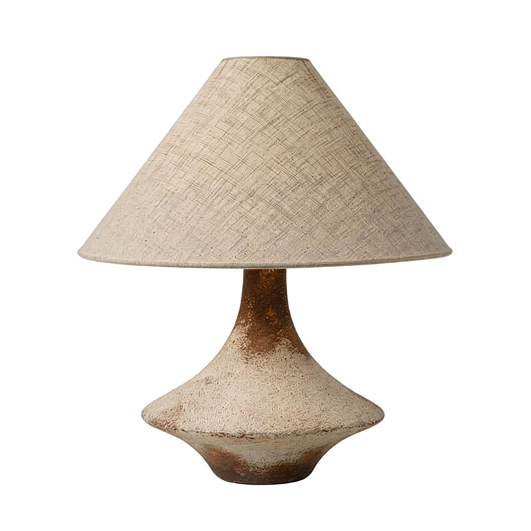 Gray ceramic table lamp product image on a white background with a sculptural base and beige fabric shade.