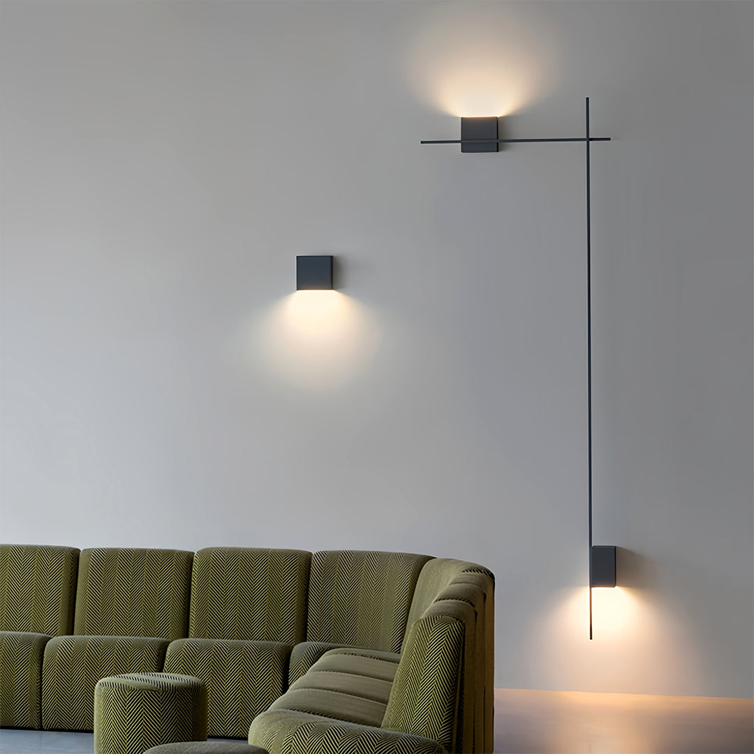 Stylish decor wall lights with green accent furniture creating modern contrast in contemporary space