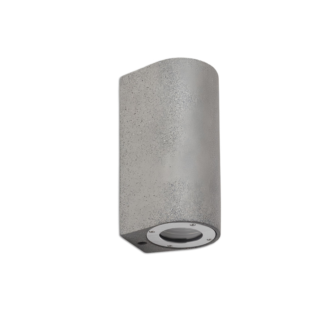 Sleek grey cylindrical fixture offering up down wall lights designed for modern outdoor facades.