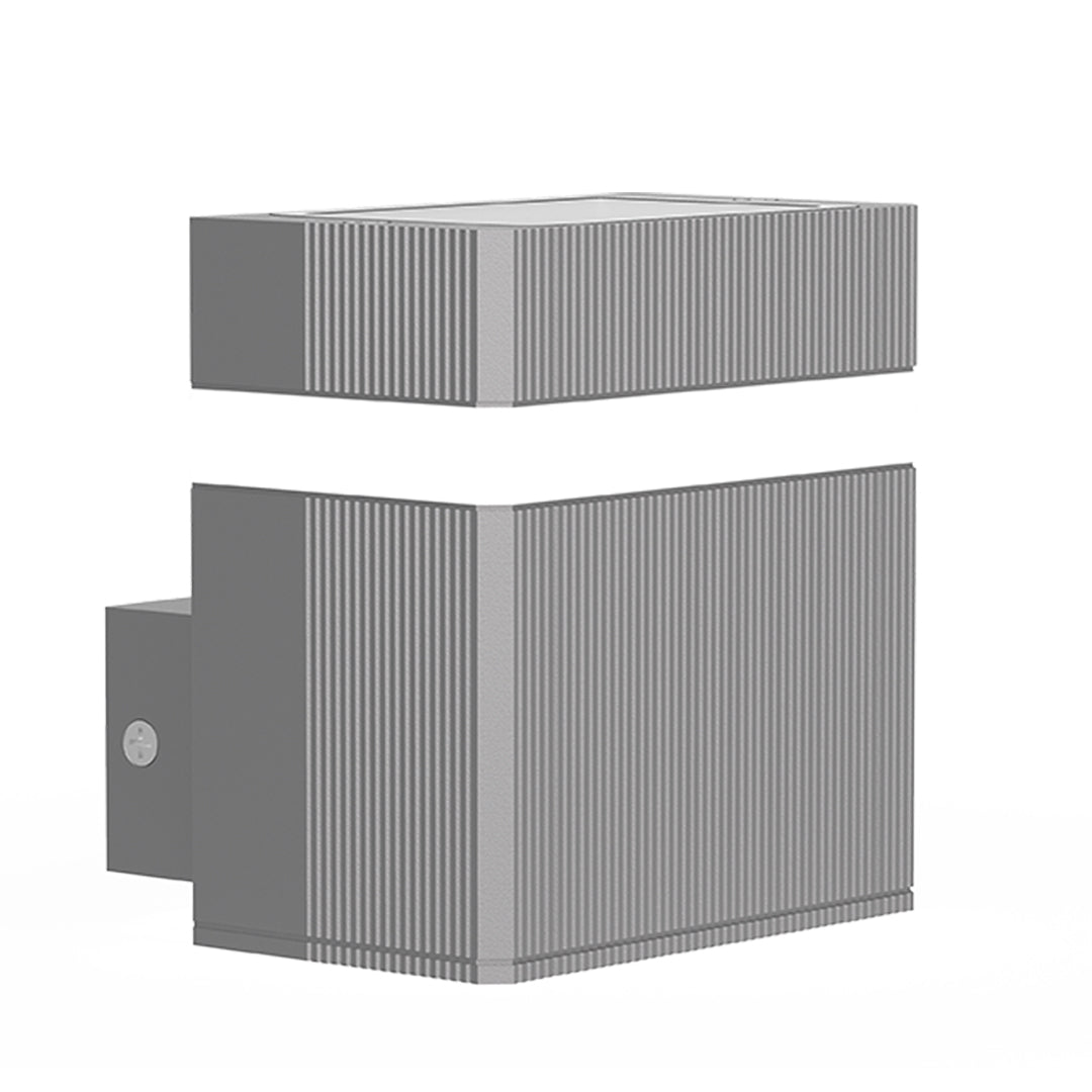 Grey cylindrical garden wall light with vertical ribbed texture and bidirectional light output