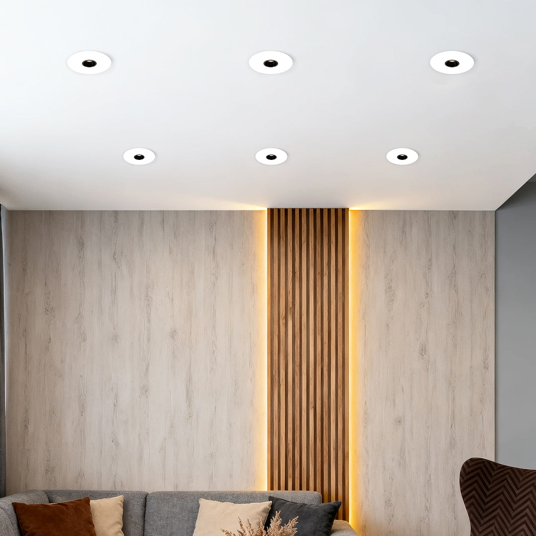 Grid of LED recessed spotlights illuminating serene modern interior with vertical wood slat feature wall