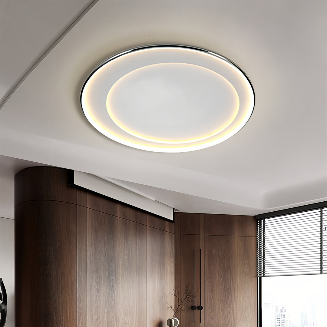 LED round flush mount light mounted in hallway ceiling with wood paneling and modern decor