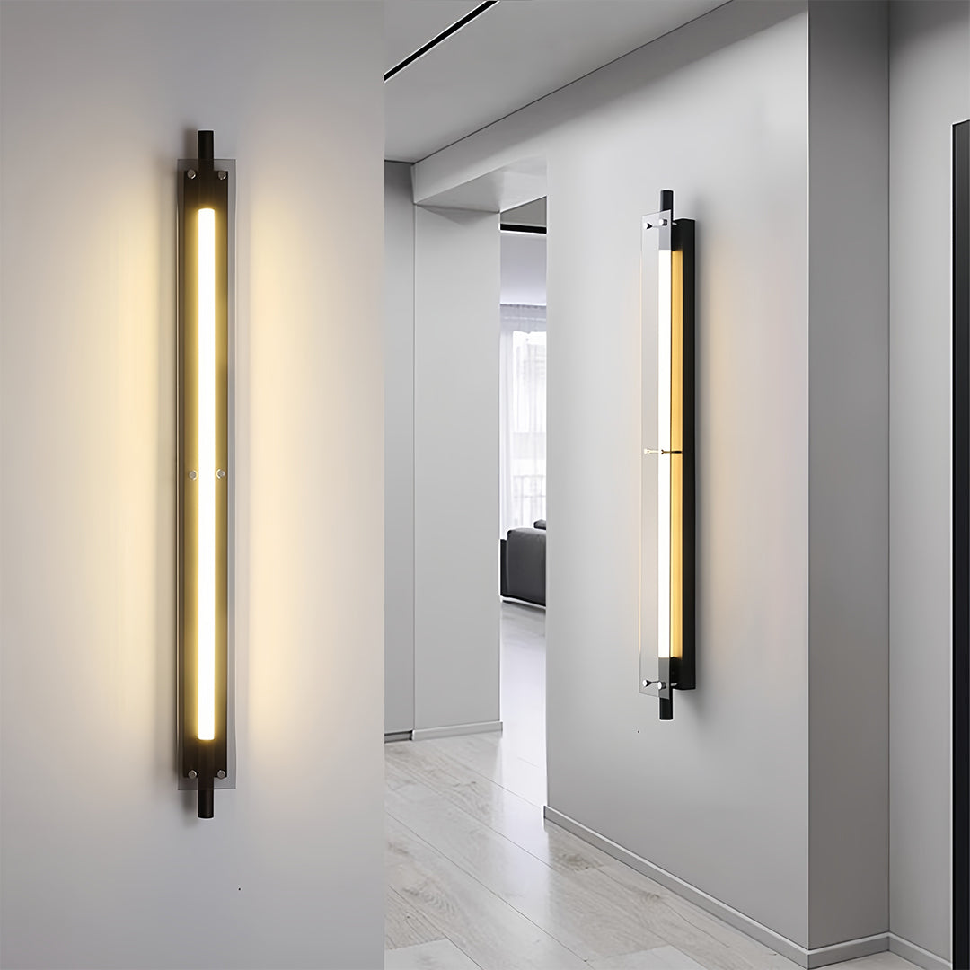 Hallway interior illuminated by vertical led wall strip lights, creating a clean and modern lighting pathway.
