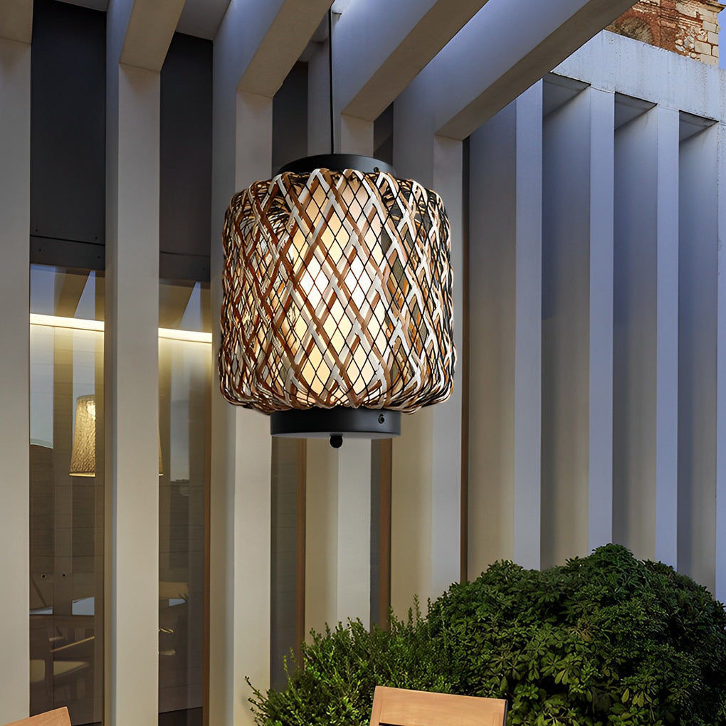 Hanging lantern lamp with woven design in modern outdoor setting.