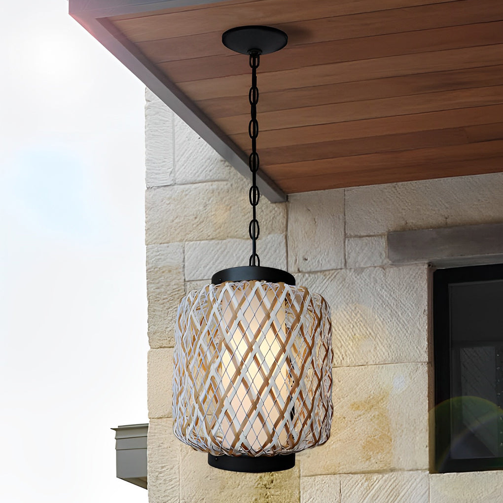 Hanging lantern lamp with woven pattern in outdoor dining area.