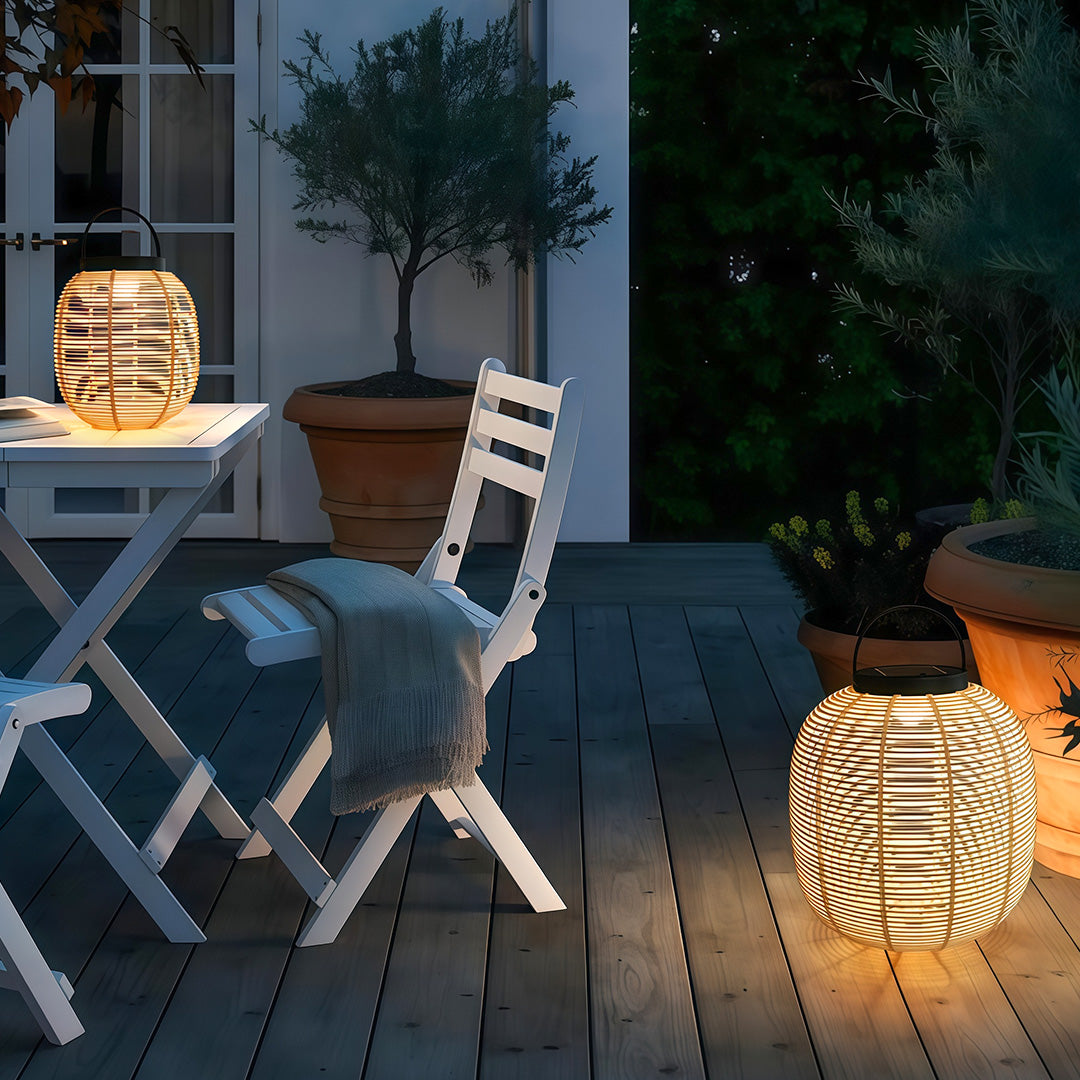 Solar-powered LED lantern hanging outdoors, enhancing the garden's atmosphere with a soft, warm glow.