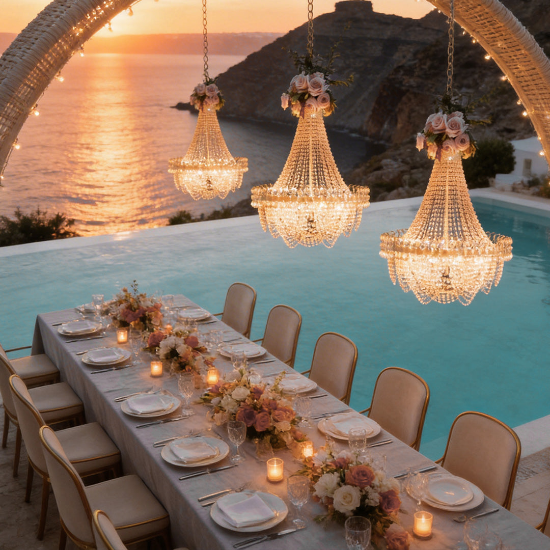 Hanging light outdoor with crystal details, providing warm illumination for a seaside event.