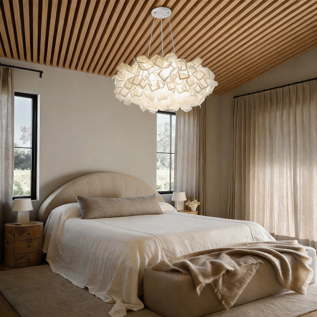 Elegant hanging petal light fixture illuminating a modern bedroom with soft, ambient glow.