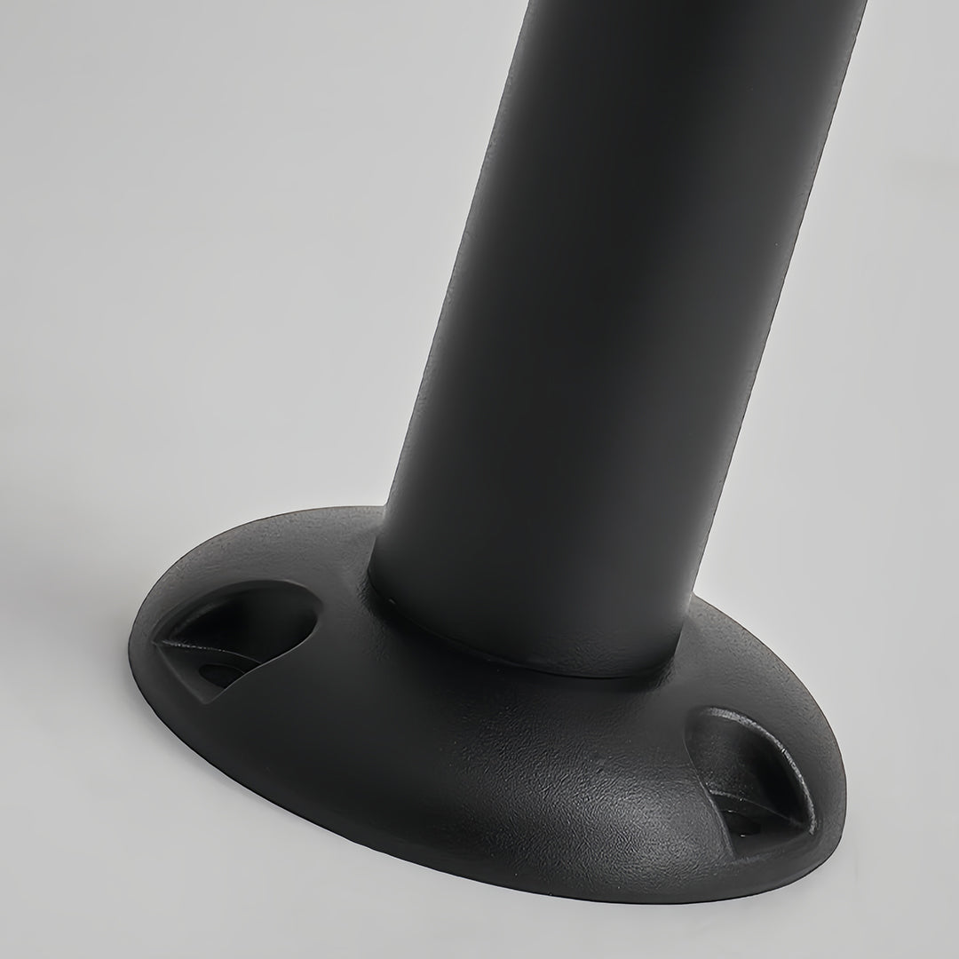 Close-up on the heavy-duty round base of the metal pathway lights fixture, designed for secure ground mounting.