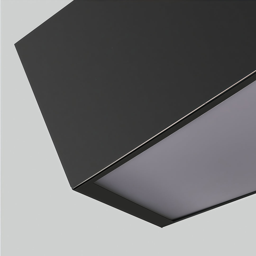 A modern geometric chandelier with hexagonal elements, providing ambient and stylish lighting for interiors.