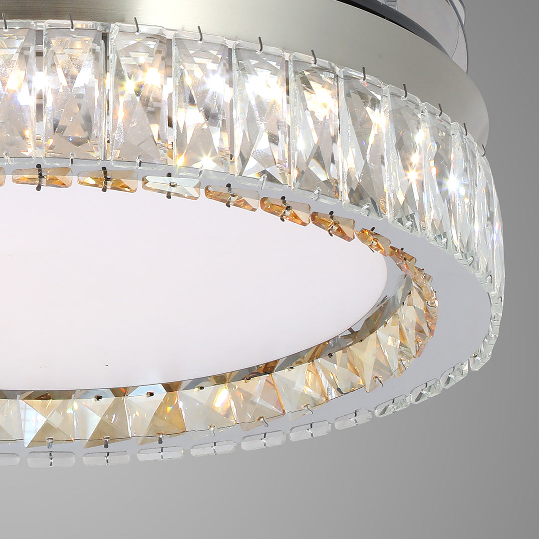 High-definition close-up of the elegant amber-tinted crystal ceiling fan with light trim 