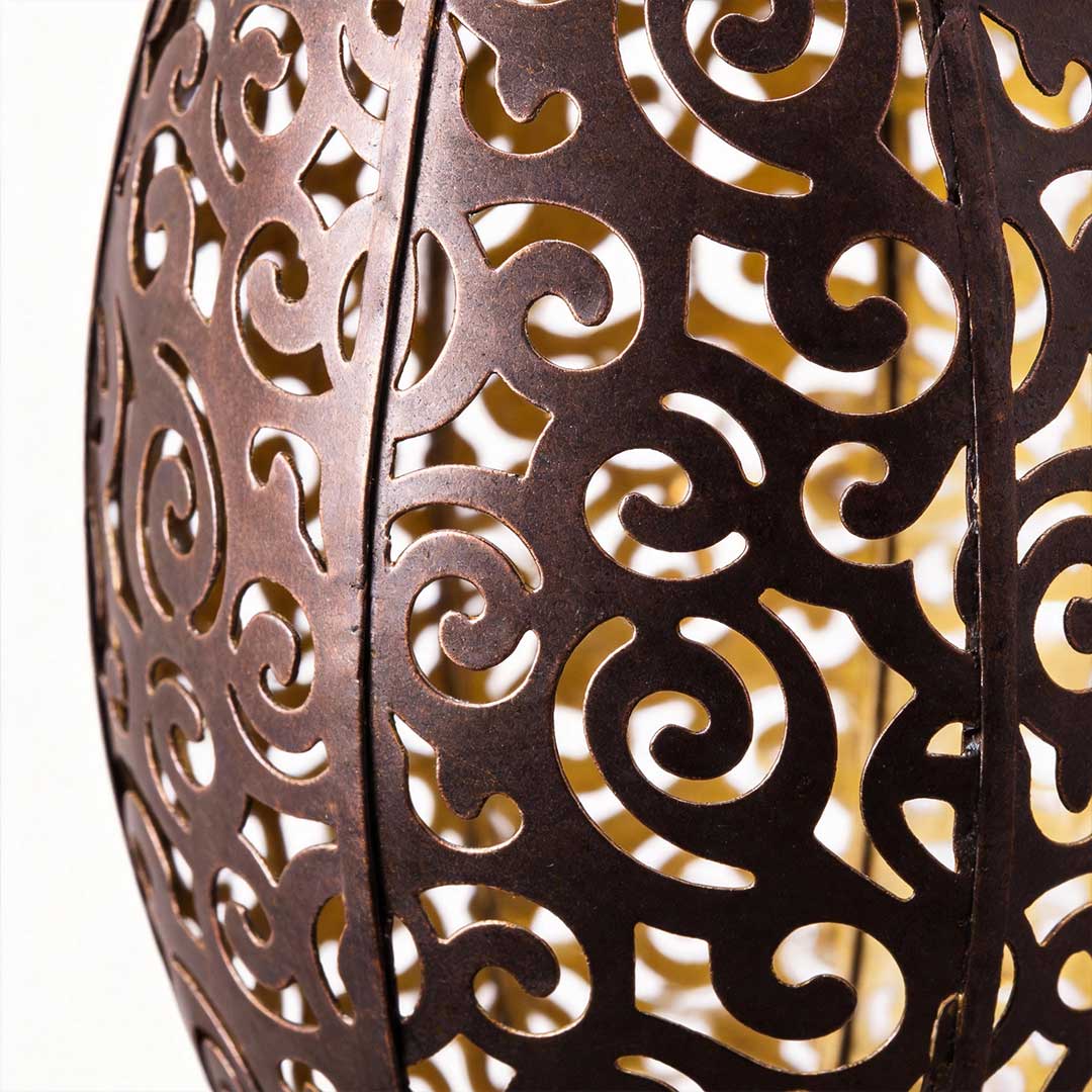 Hollow outdoor solar lights with a close-up of the solar panel on top.