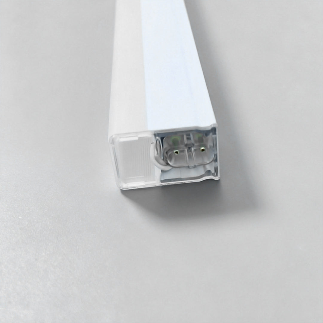 White aluminum connector accessory for modular honeycomb ceiling light LED system installation.