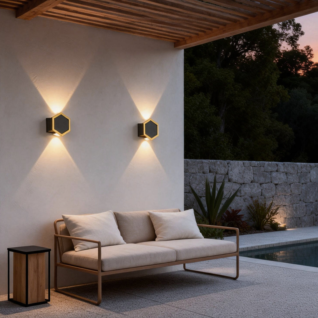 Honeycomb LED lights wall enhancing a contemporary outdoor seating area with elegant ambient light.