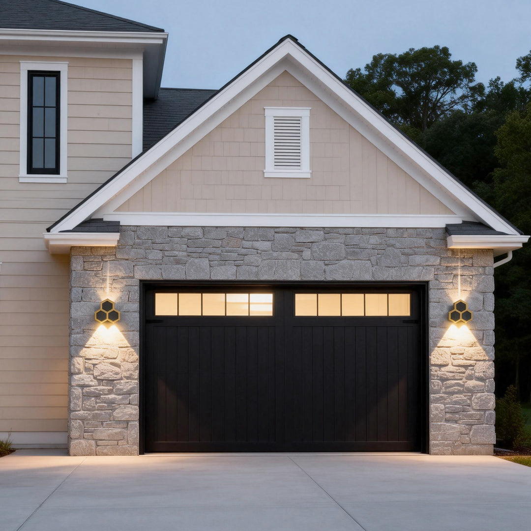 Honeycomb LED lights wall illuminating a modern garage exterior with warm directional glow.
