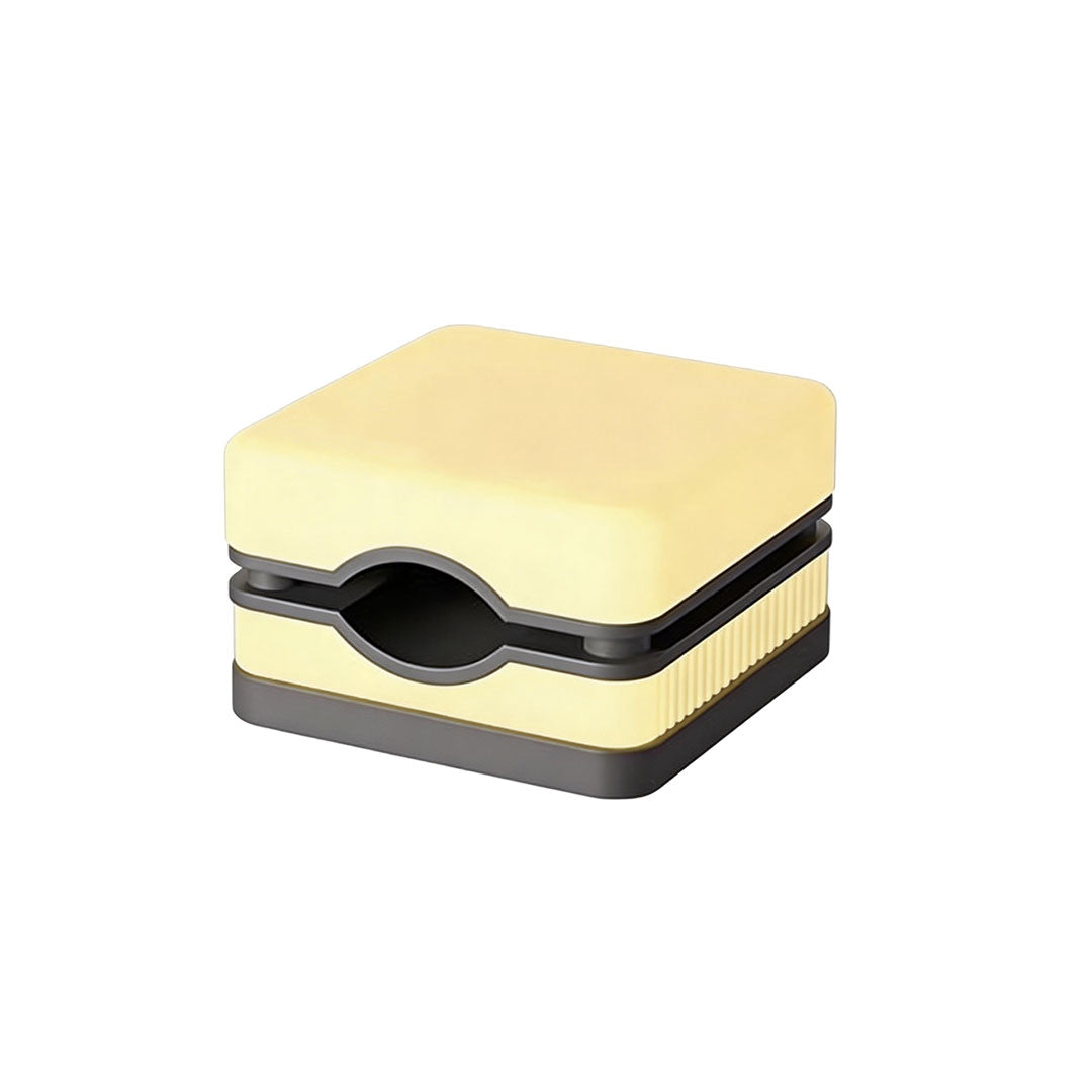 Modern house pillar lights with a geometric design and warm yellow light for garden pathways.