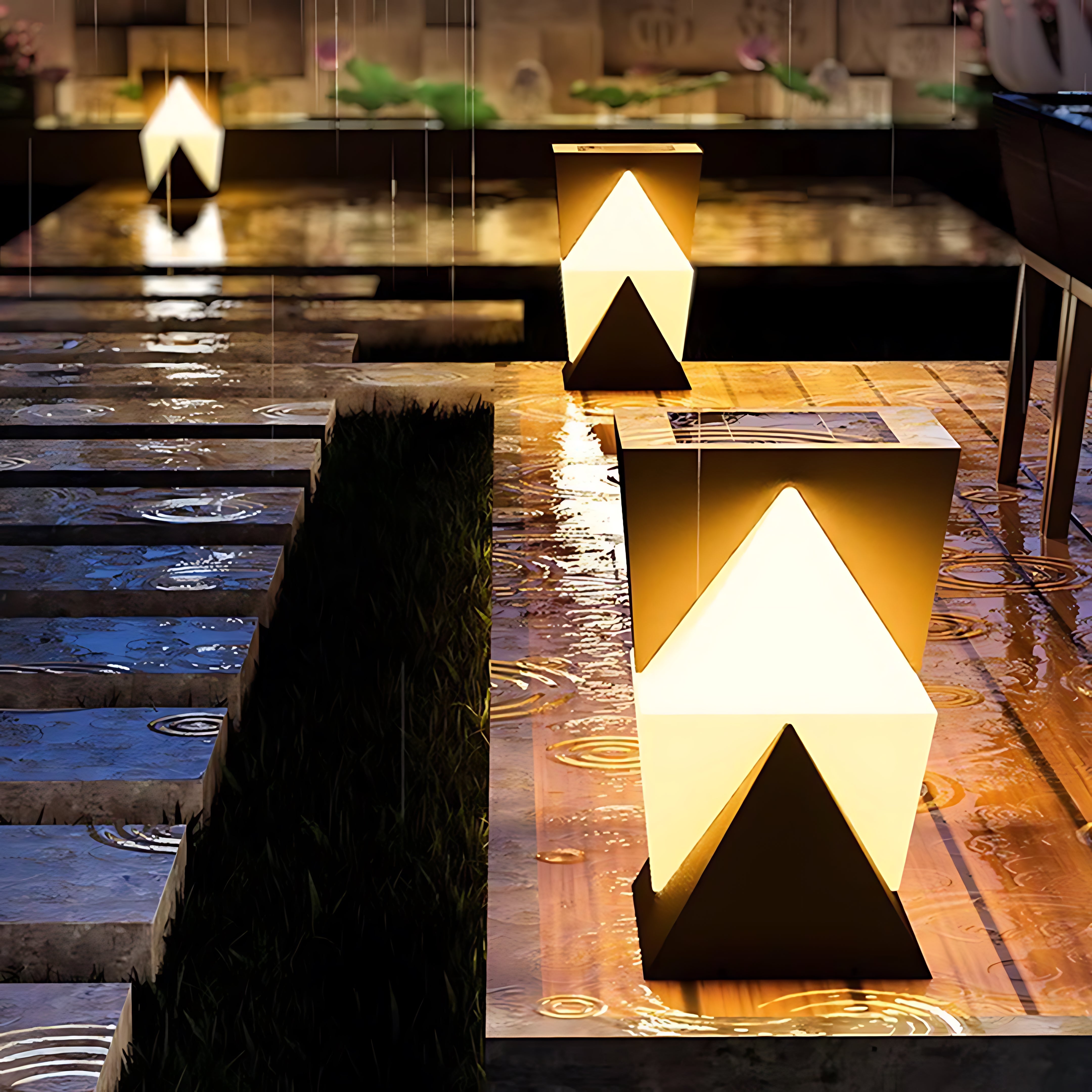 Illuminated chevron USB rechargeable table lamps providing dynamic outdoor lighting for modern building facade
