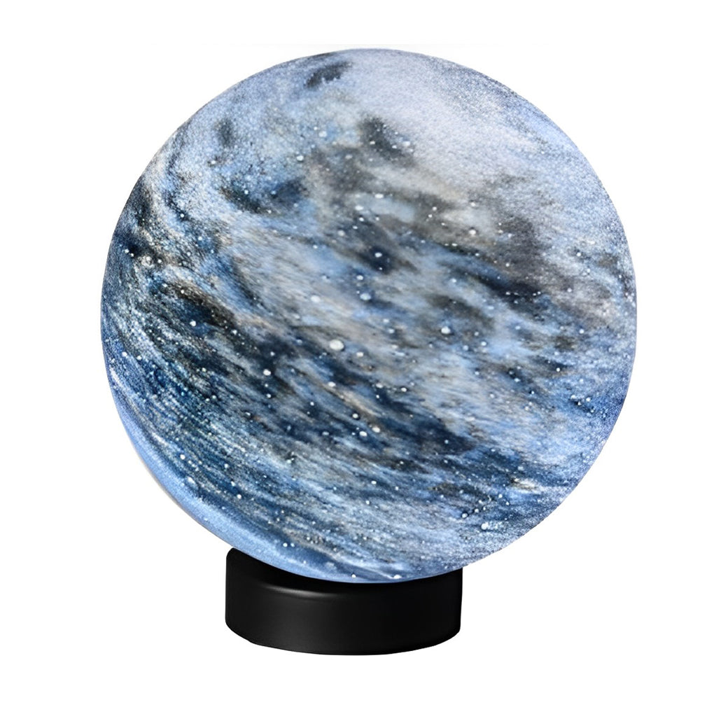 Globe pillar lights with illuminated marble texture on stand.