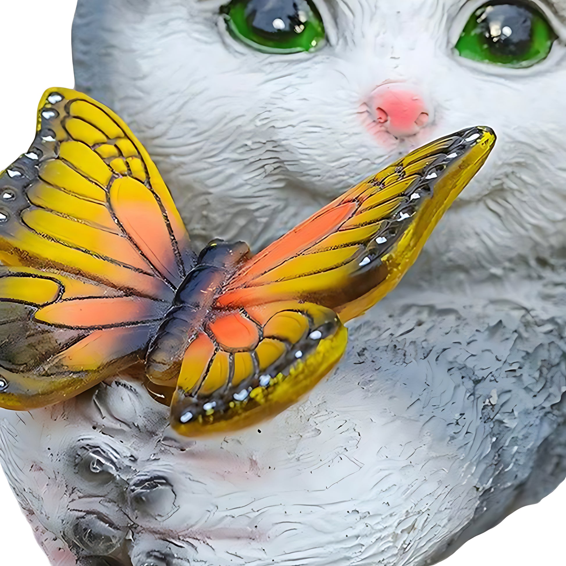 Close-up detail of illuminated monarch butterfly decoration showing realistic wing patterns and lighting