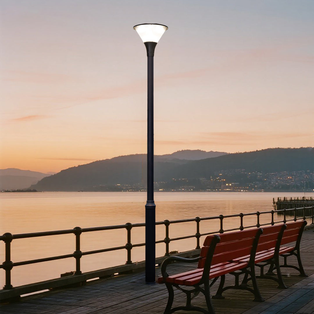 Illuminated pathway lights creating safe pedestrian walkway during golden hour sunset