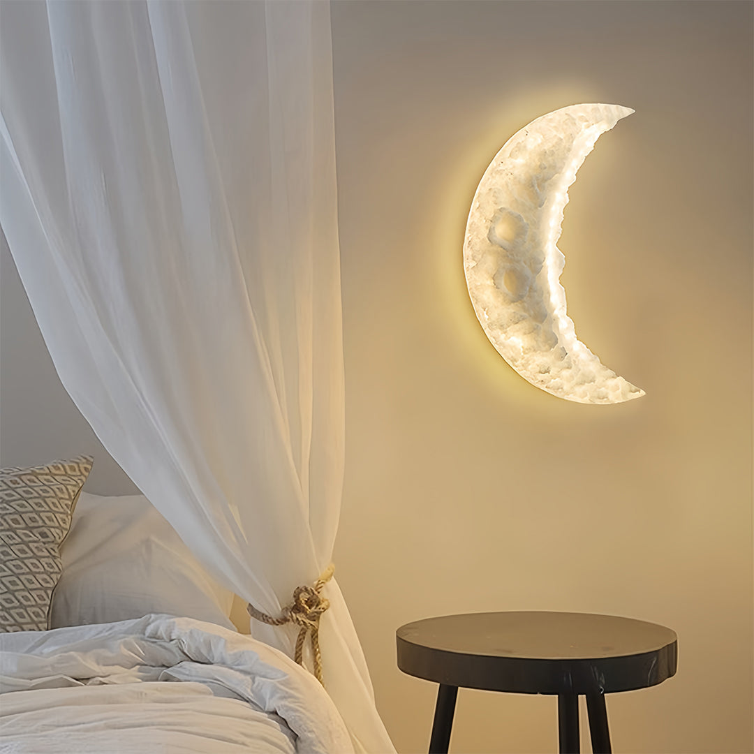 Illuminated wall light moon mounted on dark surface showcasing warm ambient lighting effect