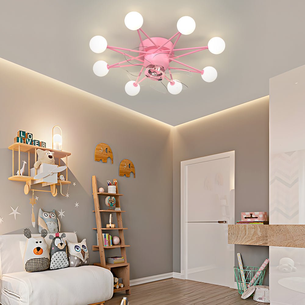 Indoor ceiling fans with lights with a pink and gold design, providing warm light in a child's room.