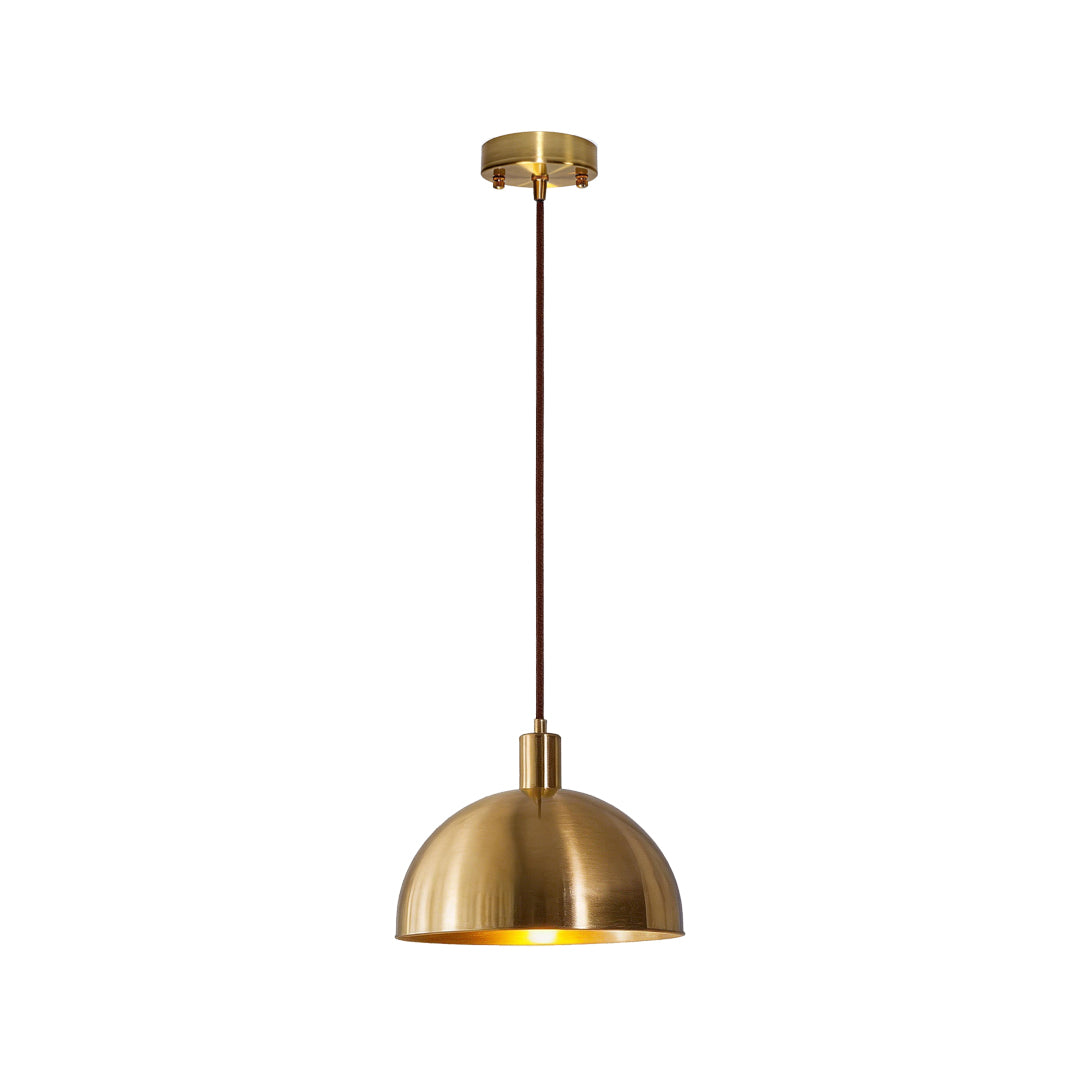 Single brass pendant lighting indoor spotlight lamp isolated with long cord and dome shade design.
