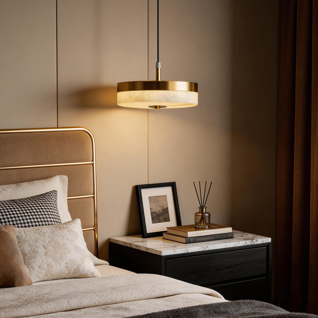 Bedroom scene featuring disc pendant light indoor spotlight lamp adding soft glow beside bed.