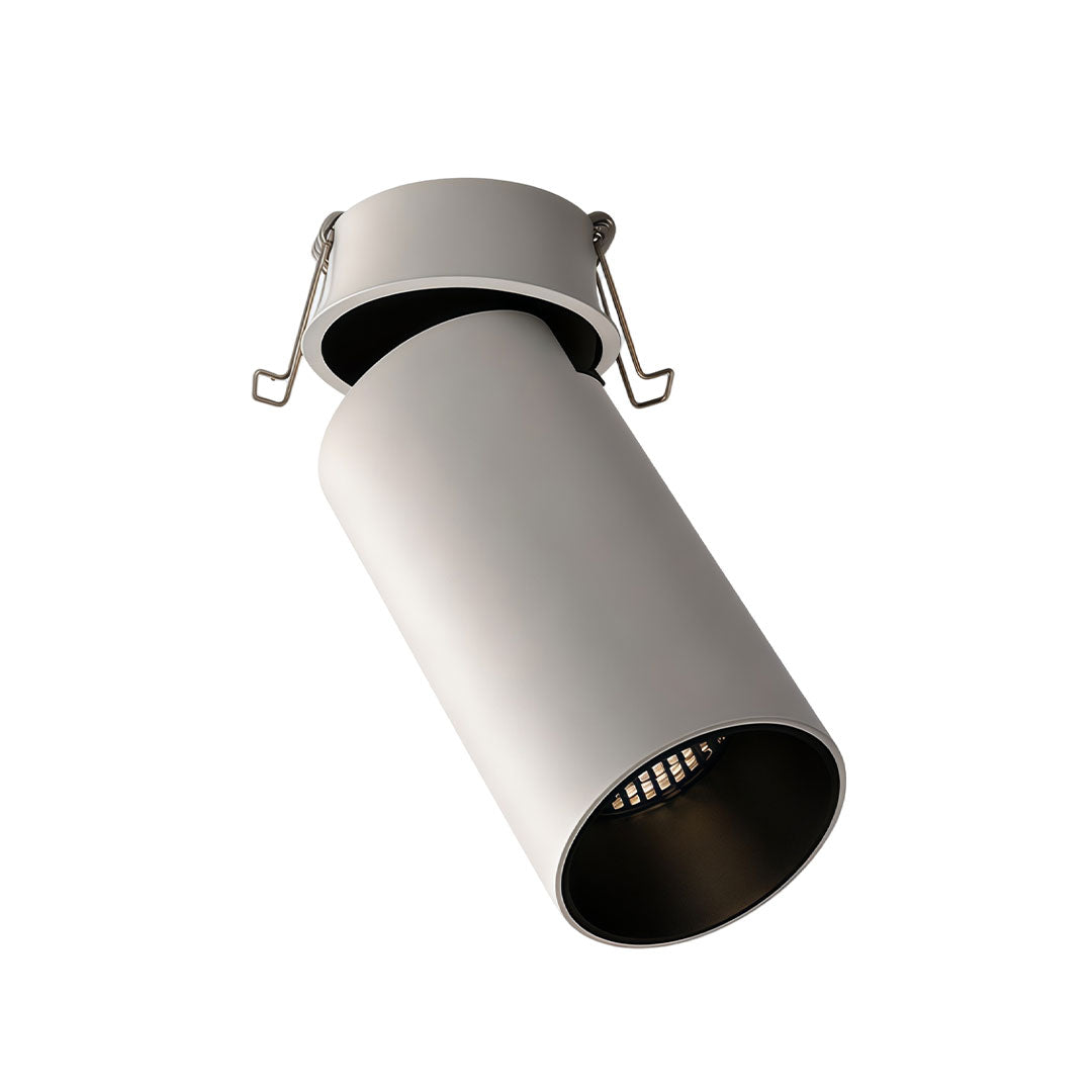 Cylindrical indoor spotlight lamp with a detailed lens, viewed from below.