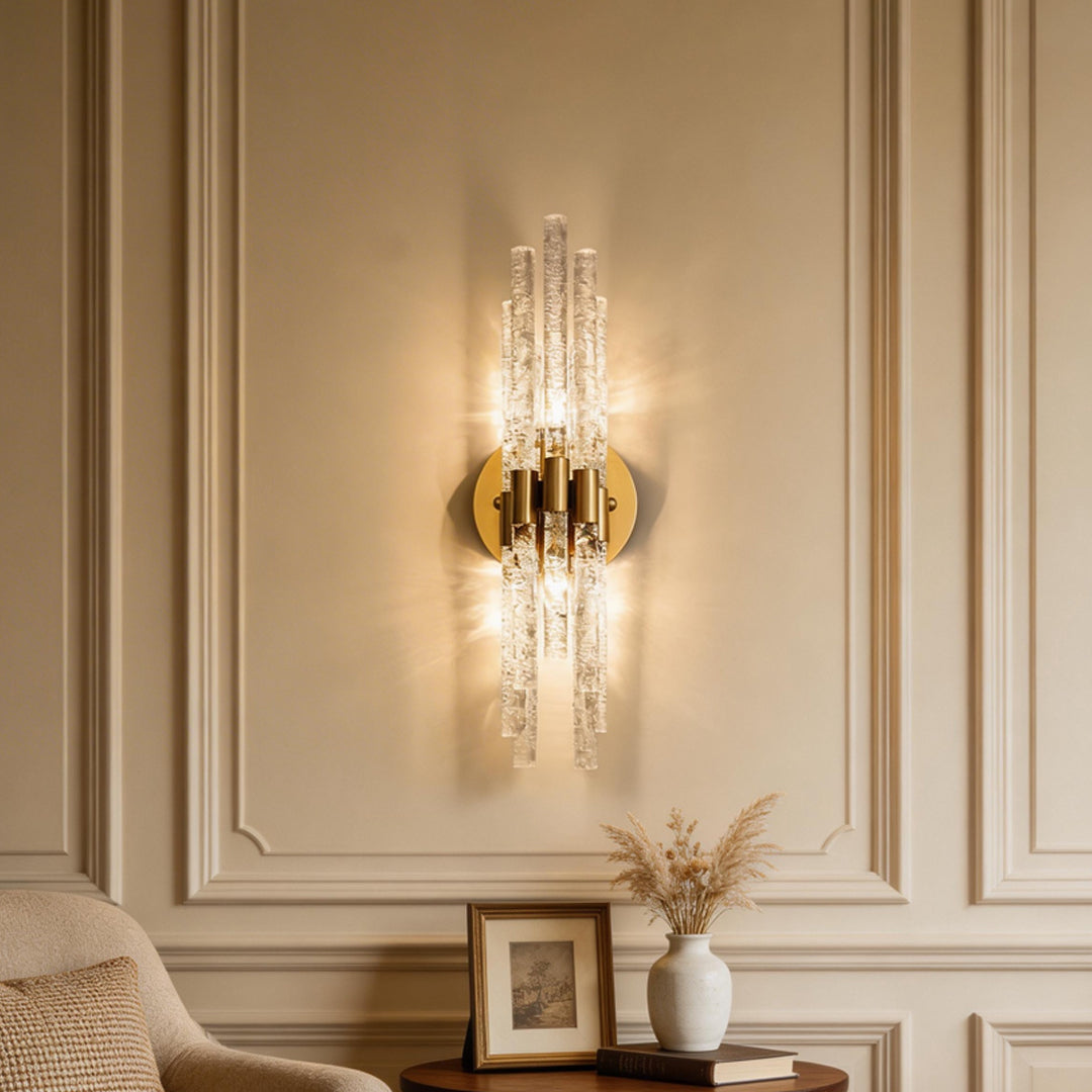 Elegant interior wall featuring modern crystal wall light indoor spotlight lamp with cascading glass rods and warm glow.