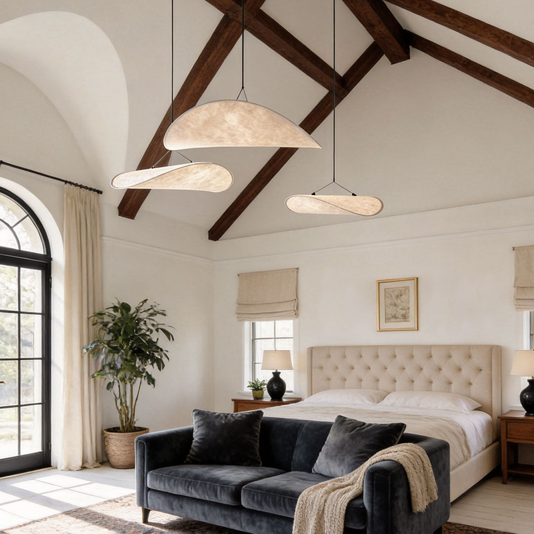 Luxury bedroom with oversized chandeliers indoor spotlight lamp suspended from high ceiling beams.