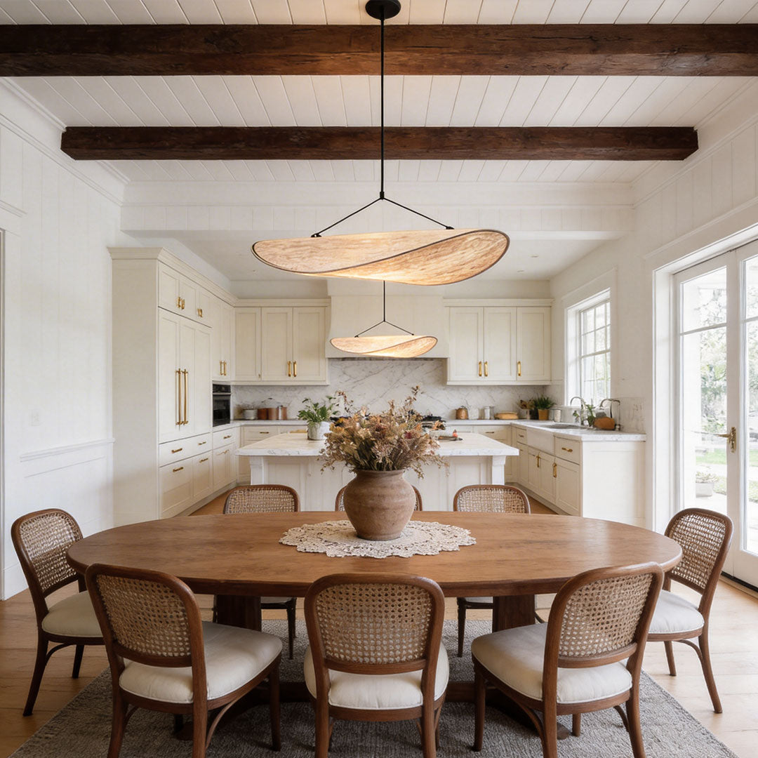 Dining room styled with oversized chandeliers indoor spotlight lamp above table with elegant organic design.