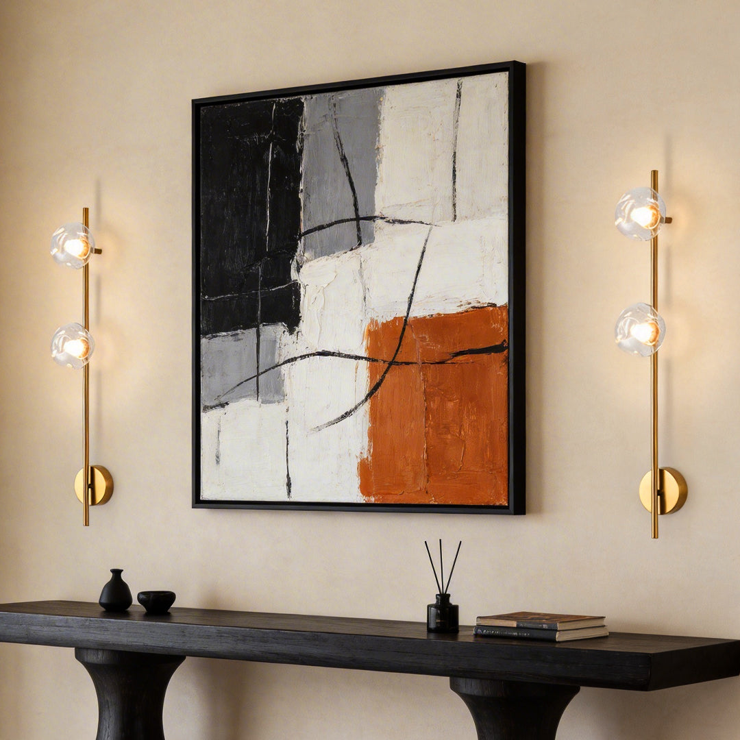 Indoor wall mounted lights with a sleek design, enhancing a modern living room.