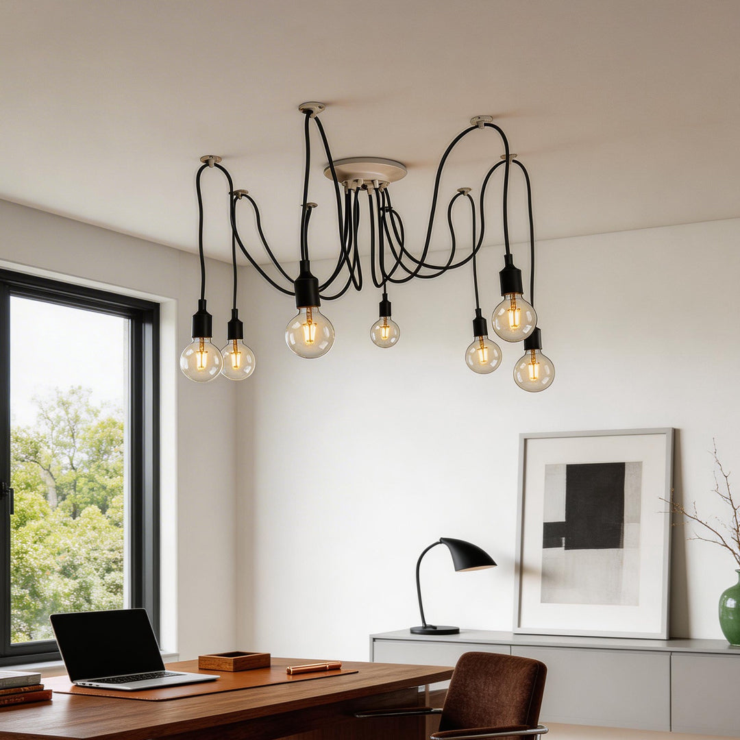 Industrial style black spider chandelier hanging in a home office study.