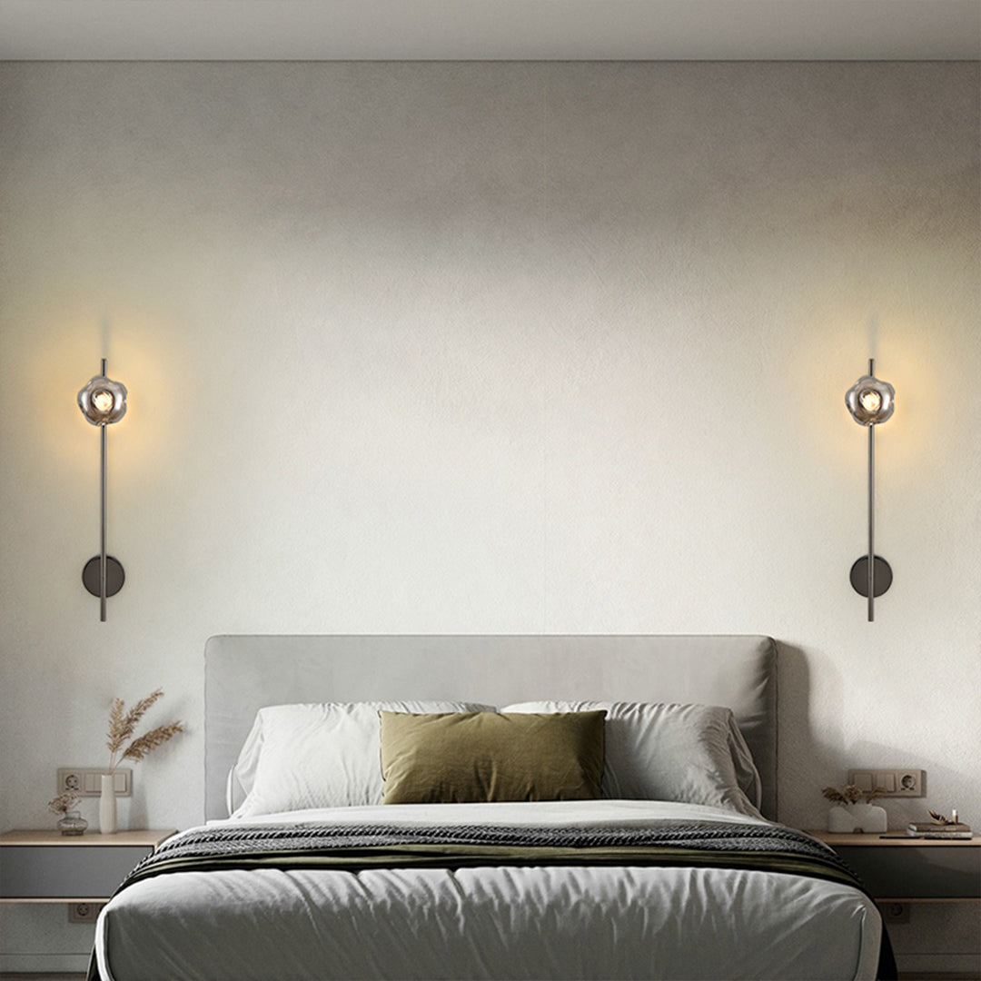 Industrial indoor wall mounted lights with brass finish creating dramatic hallway illumination