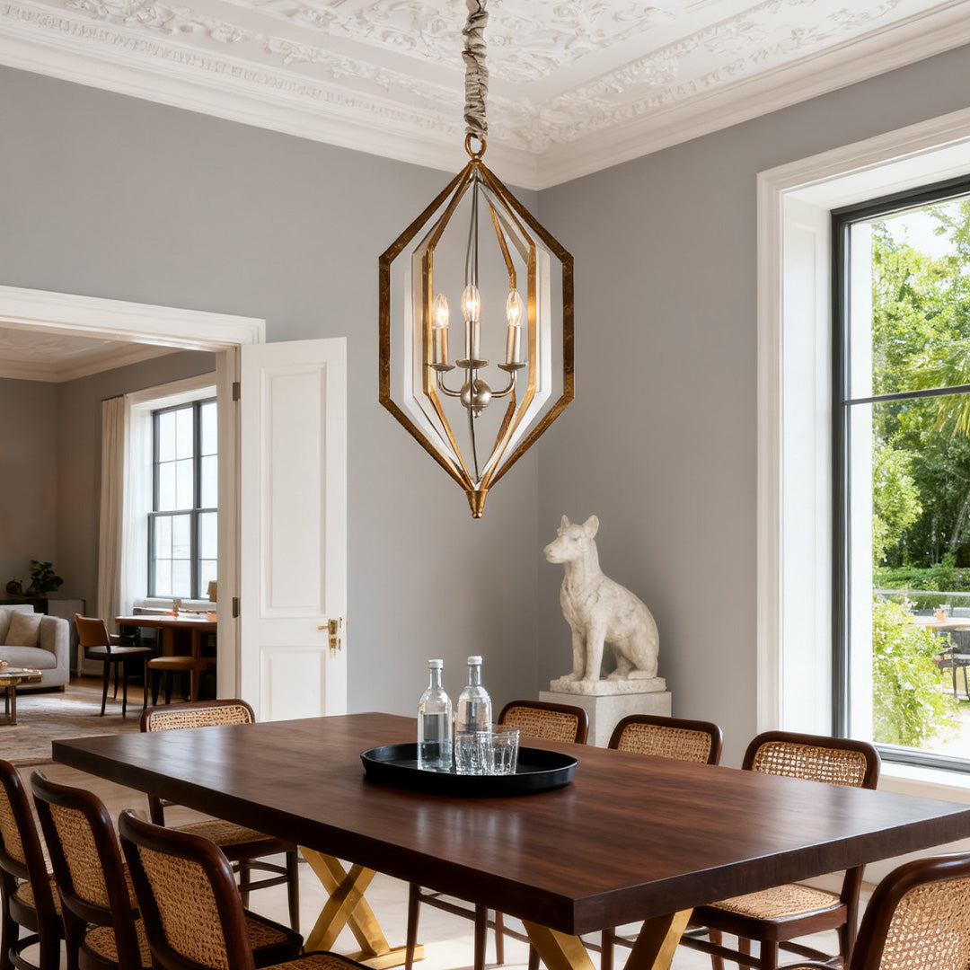 Industrial-style brown pendant lights with a dark bronze cage and inner fabric shade, hanging over a light wood kitchen island.