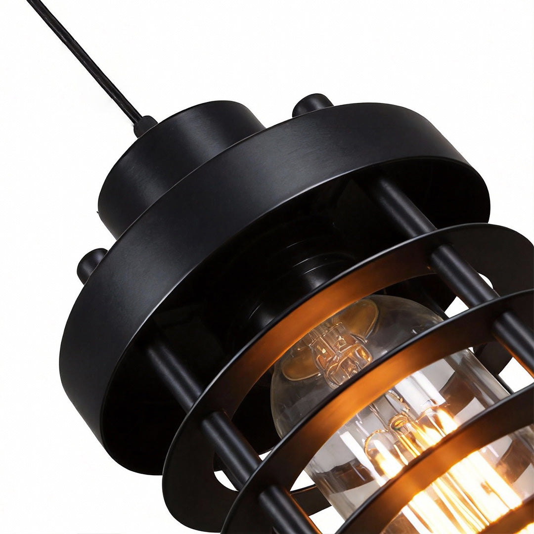 Angled close-up of industrial cage pendant light highlighting the metal frame and bulb.