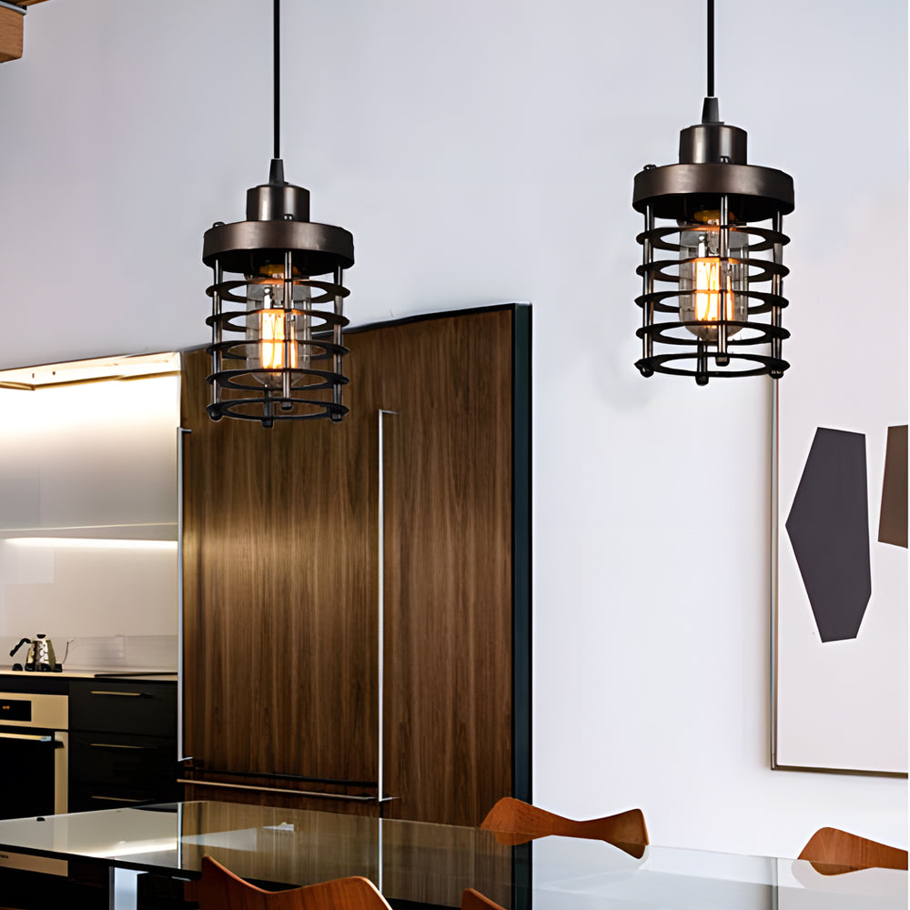 Industrial cage pendant lights used as accent lighting in a modern dining space.
