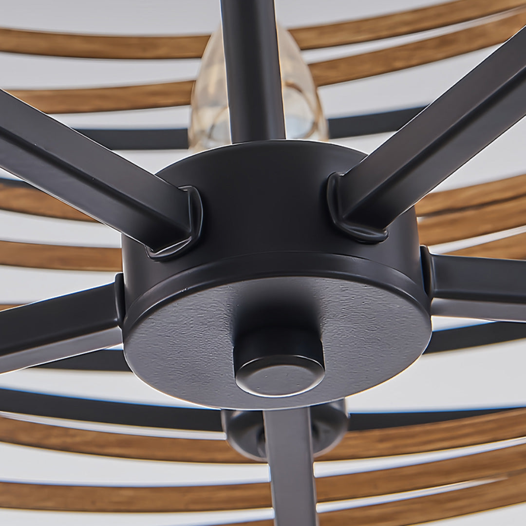 Black drum pendant light with visible bulbs, adding an industrial chic vibe to open-plan living spaces.