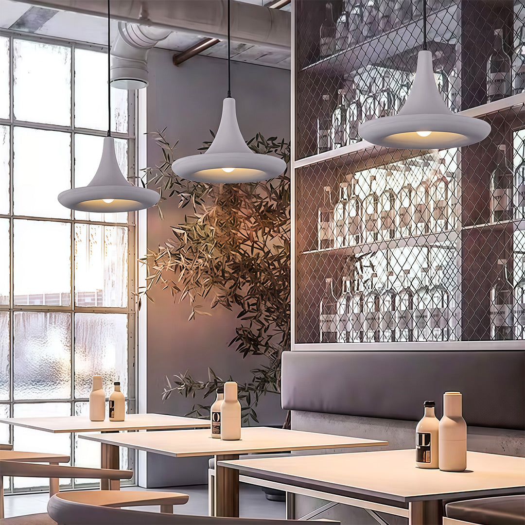 Industrial Japanese pendant light fixtures with glass shade chandelier styling in clustered white hammered metal arrangement.