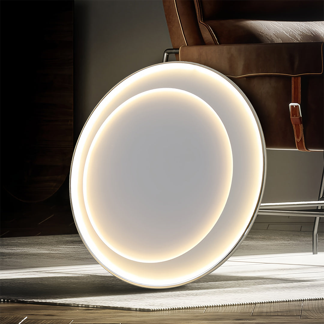 Warm LED round flush mount light illuminating industrial-style interior with exposed elements