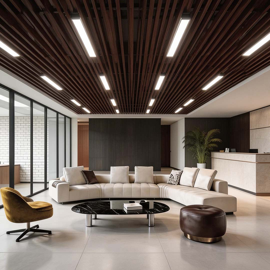 Industrial linear lighting installed in a modern office with wooden ceiling panels.