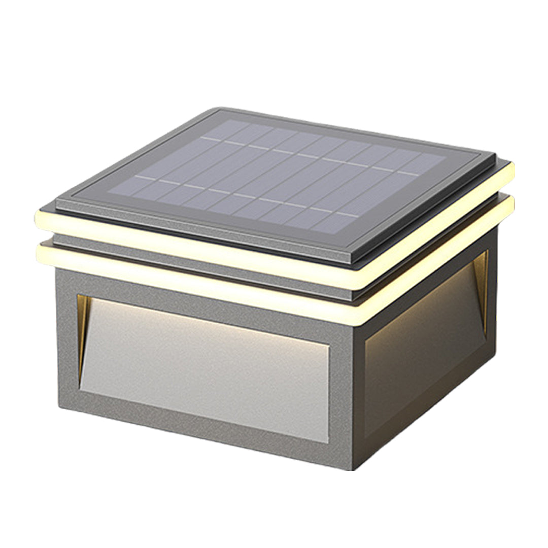 Industrial-style metal pillar lights with textured concrete finish and subtle LED illumination for modern landscape design