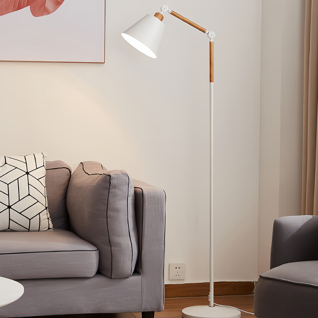 Industrial metallic floor lamp with white shade and copper arm detail showing premium construction quality